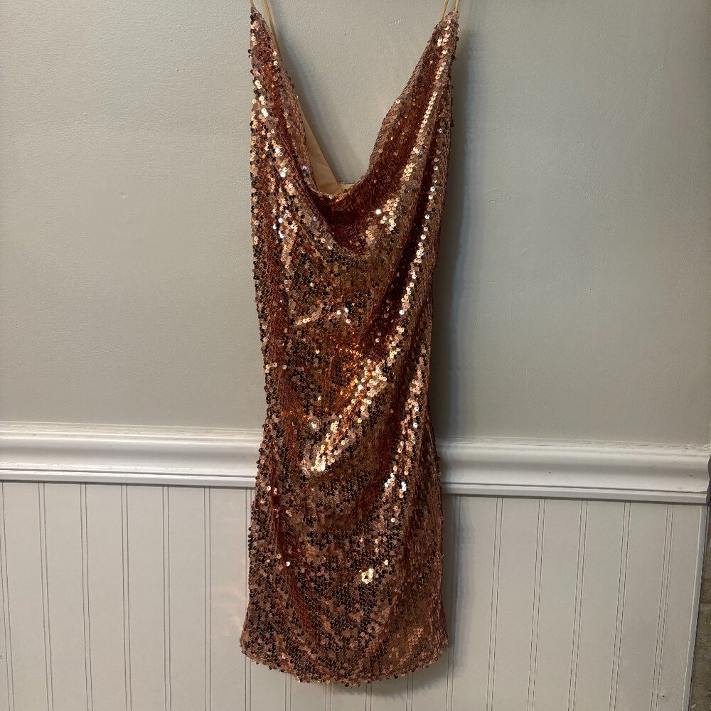 I am selling a sparkly gold dress!